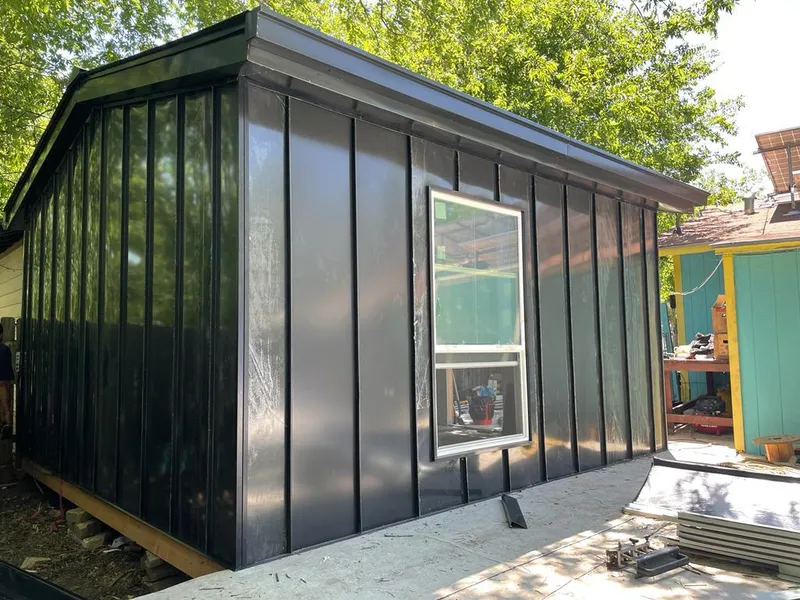 Black standing seam metal wall panels for Metal Roof Installation in North College Hill