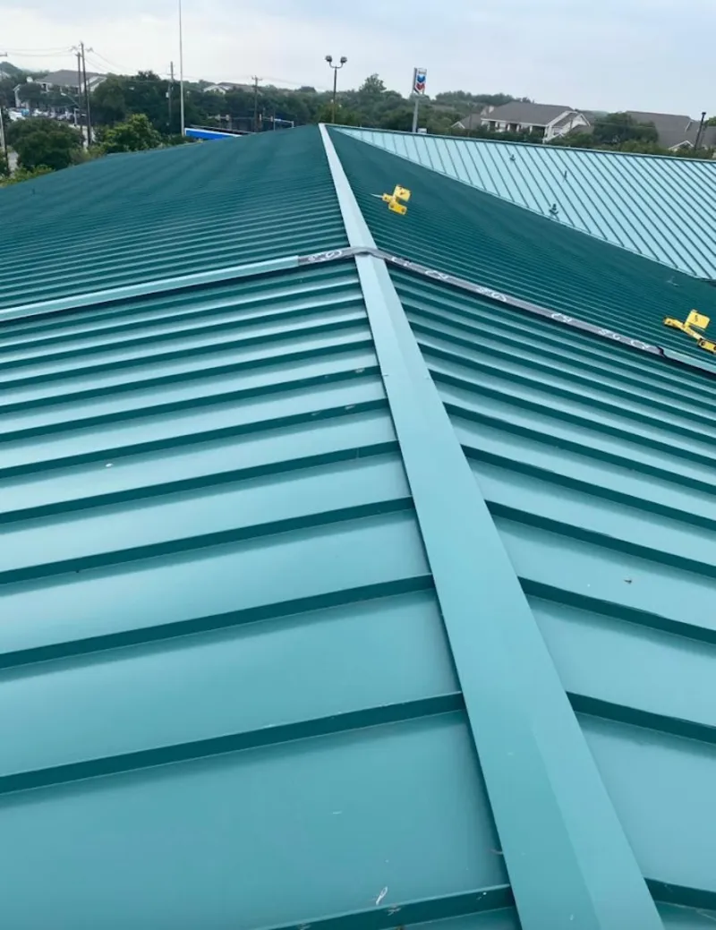 Green commercial metal roof ridge and valley for Metal Roof Repair in North College Hill